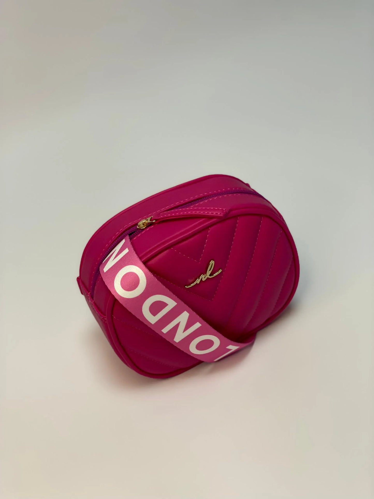 RIÑONERA NATY FUCSIA